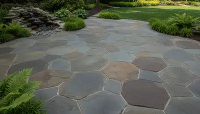 Flagstone patio with natural stone pavers and expert masonry by Chop Chop Landscaping in Cincinnati, OH